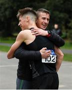 7 March 2020; David Kenny of Farranfore Maine Valley AC, Kerry, is congratulated by coach Rob Heffernan, right, following the Irish Life Health National 20k Walks Championships at St Anne's Park in Raheny, Dublin. Photo by Ramsey Cardy/Sportsfile