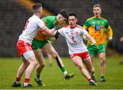7 March 2020; Ronan Frain of Donegal in action against Kevin Barker, left, and Michael Gallagher of Tyrone during the EirGrid Ulster GAA Football U20 Championship Final match between Tyrone and Donegal at St Tiernach's Park in Clones, Monaghan. Photo by Oliver McVeigh/Sportsfile