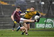 7 March 2020; Eoin Mannion of Galway kicks a point under pressure from Pearse Frost of Roscommon during the EirGrid Connacht GAA Football U20 Championship Final match between Galway and Roscommon at Tuam Stadium in Tuam, Galway. Photo by Seb Daly/Sportsfile