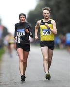 7 March 2020; Olga Niedzialek of Poland and Joe Mooney of Adamstown AC, Wexford, competing during the Irish Life Health National 20k Walks Championships at St Anne's Park in Raheny, Dublin. Photo by Ramsey Cardy/Sportsfile