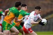 7 March 2020; Ryan Jones of Tyrone in action against Cormac Finn and Paul O'Hare of Donegal during the EirGrid Ulster GAA Football U20 Championship Final match between Tyrone and Donegal at St Tiernach's Park in Clones, Monaghan. Photo by Oliver McVeigh/Sportsfile