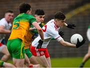 7 March 2020; Ryan Jones of Tyrone in action against Cormac Finn and Paul O'Hare of Donegal during the EirGrid Ulster GAA Football U20 Championship Final match between Tyrone and Donegal at St Tiernach's Park in Clones, Monaghan. Photo by Oliver McVeigh/Sportsfile