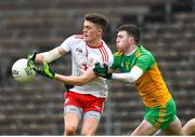 7 March 2020; Matthew Murnaghan of Tyrone in action against Luke Gavigan of Donegal during the EirGrid Ulster GAA Football U20 Championship Final match between Tyrone and Donegal at St Tiernach's Park in Clones, Monaghan. Photo by Oliver McVeigh/Sportsfile