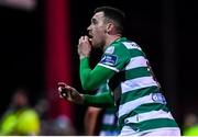 7 March 2020; Aaron Greene of Shamrock Rovers eats a chip that was thrown at him by Sligo Rovers supporters after scoring his side's third goal during the SSE Airtricity League Premier Division match between Sligo Rovers and Shamrock Rovers at The Showgrounds in Sligo. Photo by Stephen McCarthy/Sportsfile