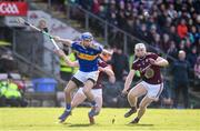 8 March 2020; John McGrath of Tipperary in action against Shane Cooney, right, and Darren Morrissey of Galway during the Allianz Hurling League Division 1 Group A Round 3 match between Galway and Tipperary at Pearse Stadium in Salthill, Galway. Photo by Sam Barnes/Sportsfile