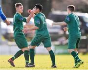8 March 2020; Kaito Akimoto of Cabinteely, centre, celebrates after scoring his side's first goal with team-mates Dylan Thornton, left, and Zak O’Neill during the EA Sports Cup First Round match between Cabinteely and Crumlin United at Stradbrook in Blackrock, Dublin. Photo by Ben McShane/Sportsfile