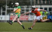 8 March 2020; Gerry Gilmore of Donegal in action against Odhran Curry of Armagh during the Allianz Hurling League Round 3A Final match between Armagh and Donegal at Páirc Éire Óg in Carrickmore, Tyrone. Photo by Oliver McVeigh/Sportsfile