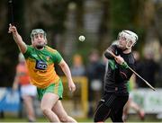8 March 2020; Simon Doherty of Armagh in action against Gerry Gilmore of Donegal during the Allianz Hurling League Round 3A Final match between Armagh and Donegal at Páirc Éire Óg in Carrickmore, Tyrone. Photo by Oliver McVeigh/Sportsfile