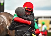 10 March 2020; Jockey Brendan Powell celebrates with trainer David Bridgwater after winning the Ultima Handicap Chase on The Conditional during Day One of the Cheltenham Racing Festival at Prestbury Park in Cheltenham, England. Photo by David Fitzgerald/Sportsfile