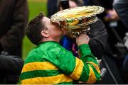 10 March 2020; Jockey Barry Geraghty celebrates with the cup after winning the Unibet Champion Hurdle Challenge Trophy on Epatante on Day One of the Cheltenham Racing Festival at Prestbury Park in Cheltenham, England. Photo by Harry Murphy/Sportsfile