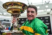 10 March 2020; Jockey Barry Geraghty celebrates with the cup after winning the Unibet Champion Hurdle Challenge Trophy on Epatante on Day One of the Cheltenham Racing Festival at Prestbury Park in Cheltenham, England. Photo by David Fitzgerald/Sportsfile