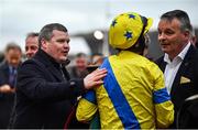 10 March 2020; Trainer Gordan Elliott, left, congratulates Jockey Jamie Codd after winning the National Hunt Challenge Cup Amateur Riders´ Novices´ Chase on Ravenhill during Day One of the Cheltenham Racing Festival at Prestbury Park in Cheltenham, England. Photo by David Fitzgerald/Sportsfile