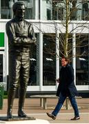 11 March 2020; Former jockey AP McCoy walks past a statue of himself prior to racing on Day Two of the Cheltenham Racing Festival at Prestbury Park in Cheltenham, England. Photo by Harry Murphy/Sportsfile