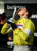 11 March 2020; Jockey Harry Skelton celebrates with the cup after winning the Betway Queen Mother Champion Chase on Politologue during Day Two of the Cheltenham Racing Festival at Prestbury Park in Cheltenham, England. Photo by Harry Murphy/Sportsfile