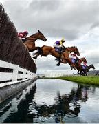 11 March 2020; Runners and riders, clear the water jump during the RSA Insurance Novices' Chase on Day Two of the Cheltenham Racing Festival at Prestbury Park in Cheltenham, England. Photo by David Fitzgerald/Sportsfile