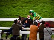 11 March 2020; Jockey Mark Walsh is congratulated by racegoers, as he makes his way to the winners enclosure, after winning the Boodles Juvenile Handicap Hurdle on Aramax during Day Two of the Cheltenham Racing Festival at Prestbury Park in Cheltenham, England. Photo by David Fitzgerald/Sportsfile