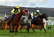 12 March 2020; The runner-up The Storyteller, with Davy Russell up, left, leads Tout Est Permis, with Eoin Walsh up, who finished third, centre, and the eventual winner Sire Du Berlais, with Barry Geraghty up, after jumping the last during the Pertemps Network Final Handicap Hurdle on Day Three of the Cheltenham Racing Festival at Prestbury Park in Cheltenham, England. Photo by David Fitzgerald/Sportsfile