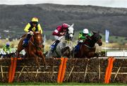 12 March 2020; The runner-up The Storyteller, with Davy Russell up, left, leads Tout Est Permis, with Eoin Walsh up, who finished third, centre, and the eventual winner Sire Du Berlais, with Barry Geraghty up, as they jump the last during the Pertemps Network Final Handicap Hurdle on Day Three of the Cheltenham Racing Festival at Prestbury Park in Cheltenham, England. Photo by David Fitzgerald/Sportsfile