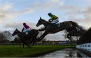 12 March 2020; Fitzhenry, with Patrick Mullins up, right, and evenautal winner Milan Native, with Rob James up, jump the water-jump during the Fulke Walwyn Kim Muir Challenge Cup Amateur Riders' Handicap Chase on Day Three of the Cheltenham Racing Festival at Prestbury Park in Cheltenham, England. Photo by Harry Murphy/Sportsfile