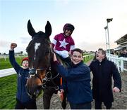 12 March 2020; Rob James on Milan Native, left, with trainer Gordon Elliott, right, celebrate after winning the Fulke Walwyn Kim Muir Challenge Cup Amateur Riders' Handicap Chase on Day Three of the Cheltenham Racing Festival at Prestbury Park in Cheltenham, England. Photo by David Fitzgerald/Sportsfile