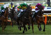 13 March 2020; Saint Roi, with Barry Geraghty up, left, on their way to winning the Randox Health County Handicap Hurdle ahead of eventual third place finisher Embittered, with JJ Slevin up, on Day Four of the Cheltenham Racing Festival at Prestbury Park in Cheltenham, England. Photo by Harry Murphy/Sportsfile