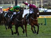 13 March 2020; Saint Roi, with Barry Geraghty up, left, on their way to winning the Randox Health County Handicap Hurdle ahead of eventual third place finisher Embittered, with JJ Slevin up, on Day Four of the Cheltenham Racing Festival at Prestbury Park in Cheltenham, England. Photo by Harry Murphy/Sportsfile