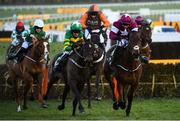 13 March 2020; Saint Roi, with Barry Geraghty up, left, on their way to winning the Randox Health County Handicap Hurdle ahead of eventual third place finisher Embittered, with JJ Slevin up, on Day Four of the Cheltenham Racing Festival at Prestbury Park in Cheltenham, England. Photo by Harry Murphy/Sportsfile