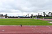 13 March 2020; A lone runner goes on a training run in Morton Stadium in Santry, Dublin. Following directives from the Irish Government and the Department of Health the majority of the country's sporting associations have suspended all activity until March 29, in an effort to contain the spread of the Coronavirus (COVID-19). Photo by Brendan Moran/Sportsfile
