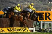 13 March 2020; Al Boum Photo, with Paul Townend up, jump the last ahead of Lostintranslation, with Robbie Power up, to win the Magners Cheltenham Gold Cup Chase on Day Four of the Cheltenham Racing Festival at Prestbury Park in Cheltenham, England. Photo by Harry Murphy/Sportsfile