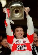 5 May 1996; Derry captain Henry Downey lifts the cup following the Church & General National Football League Final between Derry and Donegal at Croke Park in Dublin. Photo by Ray McManus/Sportsfile