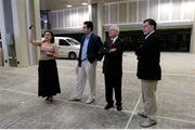 4 May 2004; Irish Chef de Mission William O'Brien, right, and Press Officer Jack McGouran, 2nd from right, are shown around the Main Press Centre at the Olympic Stadium, Athens, ahead of the forthcoming Summer Olympic Games. Athens, Greece. Photo by Brendan Moran/Sportsfile