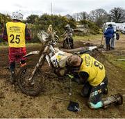 14 March 2020; Kelan Grant works on his bike during the MRA Cross Country Championship at Tinkerhill Motocross Park in Newry. Photo by Ramsey Cardy/Sportsfile