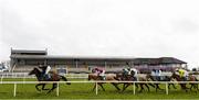 14 March 2020; Runners and riders lead by Mr Hendricks, with Paddy Kennedy up, make their way past the main stand during the Irish Stallion Farms EBF Novice Hurdle at Navan Racecourse in Navan, Meath. Photo by Matt Browne/Sportsfile