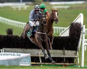 14 March 2020; Castlegrace Paddy, with Bryan Cooper up, jump the last on their way to winning Webster Cup Steeplechase ahead of Ornua, with Davy Russell up, at Navan Racecourse in Navan, Meath. Photo by Matt Browne/Sportsfile