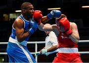 15 March 2020; Wilfried Florentin of France, left, exchanges punches with Nikoljas Grisunins of Latvia in their Men's heavyweight 81KG+ fight on Day Two of the Road to Tokyo European Boxing Olympic Qualifying Event at Copper Box Arena in Queen Elizabeth Olympic Park, London, England. Photo by Harry Murphy/Sportsfile