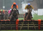 17 March 2020; Wingin a Prayer, with Robbie Power up, left, leads Double Jemmy, with David Mullins up, who finished second, as they jump the last on their way to winning the Blugrass Maiden hurdle at Down Royal in Lisburn, Co Down. Photo by Oliver McVeigh/Sportsfile