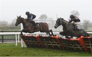 17 March 2020; Demophon, with Sarah Kavanagh up, left, jumps the last haead of Kristian Goingwel, with Aiden Kelly up, who finished second, on their way to winning the Adare Manor Opportunity Handicap Hurdle at Down Royal in Lisburn, Co Down. Photo by Oliver McVeigh/Sportsfile