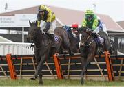 17 March 2020; Forrard Away, left, with Mark Bolger up, jumps the last alongside My Club Colours, with Sean O'Keeffe up, on their way to winning The M2 Construction Wexford Novice Handicap Hurdle at Wexford Racecourse in Carricklawn, Wexford. Photo by Matt Browne/Sportsfile