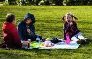 20 March 2020; Eve McNamara and her brothers Patrick and Joseph enjoy a picnic near their home in Harold's Cross, Dublin. Photo by Ray McManus/Sportsfile