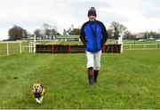 21 March 2020; Jockey Ricky Doyle goes for a walk with his dog, Millie, before his first race at Thurles Racecourse in Tipperary. Photo by Matt Browne/Sportsfile