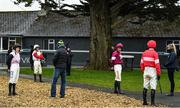 21 March 2020; Jockeys, from left, Rachael Blackmore, Phillip Enright, Davy Russell and Paul Townend maintain social distancing in the parade ring ahead of the Pierce Molony Memorial Novice Steeplechase at Thurles Racecourse in Tipperary. Photo by Matt Browne/Sportsfile