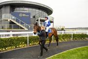 23 March 2020; Jockey Chris Hayes is led into the winners enclosure after winning the Lodge Park Stud Irish EBF Park Express Stakes on Lemista at Naas Racecourse in Naas, Co Kildare. Photo by Seb Daly/Sportsfile