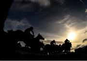 24 March 2020; A view of the field as they jump the second during the Adare Manor Opportunity Handicap Steeplechase at Clonmel Racecourse in Clonmel, Tipperary. Photo by Seb Daly/Sportsfile