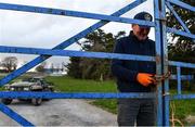 24 March 2020; Groundsman TJ Leahy locks the gates following racing at Clonmel Racecourse in Clonmel, Tipperary. Photo by Seb Daly/Sportsfile