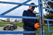 24 March 2020; Groundsman TJ Leahy locks the gates following racing at Clonmel Racecourse in Clonmel, Tipperary. Photo by Seb Daly/Sportsfile