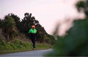 26 March 2020; Reigning Irish 5,000m track & field champion Hiko Tonosa, who is originally from Ethopia and received his certificate of naturalisation as an Irish citizen in March 2020 and is now eligible to run internationally for Ireland, during an early morning training run in Dublin, which helps him with the guidelines of social distancing and avoid contracting Coronavirus (COVID-19). Photo by Ramsey Cardy/Sportsfile