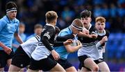 26 February 2020; Tom Stewart of St Michael's College in action against Newbridge College players, from left, Ciarán Mangan, Ronan McGroary, and Ruairí Munnelly during the Bank of Ireland Leinster Schools Junior Cup Second Round match between St Michael’s College and Newbridge College at Energia Park in Dublin. Photo by Piaras Ó Mídheach/Sportsfile