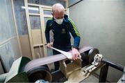 31 March 2020; David Dowling shapes the hurl by sanding off rough edges during a feature on The Star Hurley in Jenkinstown, Kilkenny. Photo by Ramsey Cardy/Sportsfile