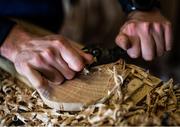 31 March 2020; David Dowling shapes the hurl with a spokeshave during a feature on The Star Hurley in Jenkinstown, Kilkenny. Photo by Ramsey Cardy/Sportsfile