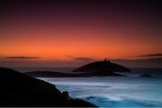 6 April 2020; The sun rises behind the Ballycotton Lighthouse in Ballycotton, Cork. Photo by Eóin Noonan/Sportsfile